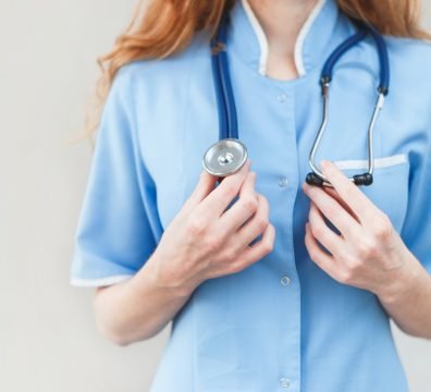 Young female doctor with stethoscope